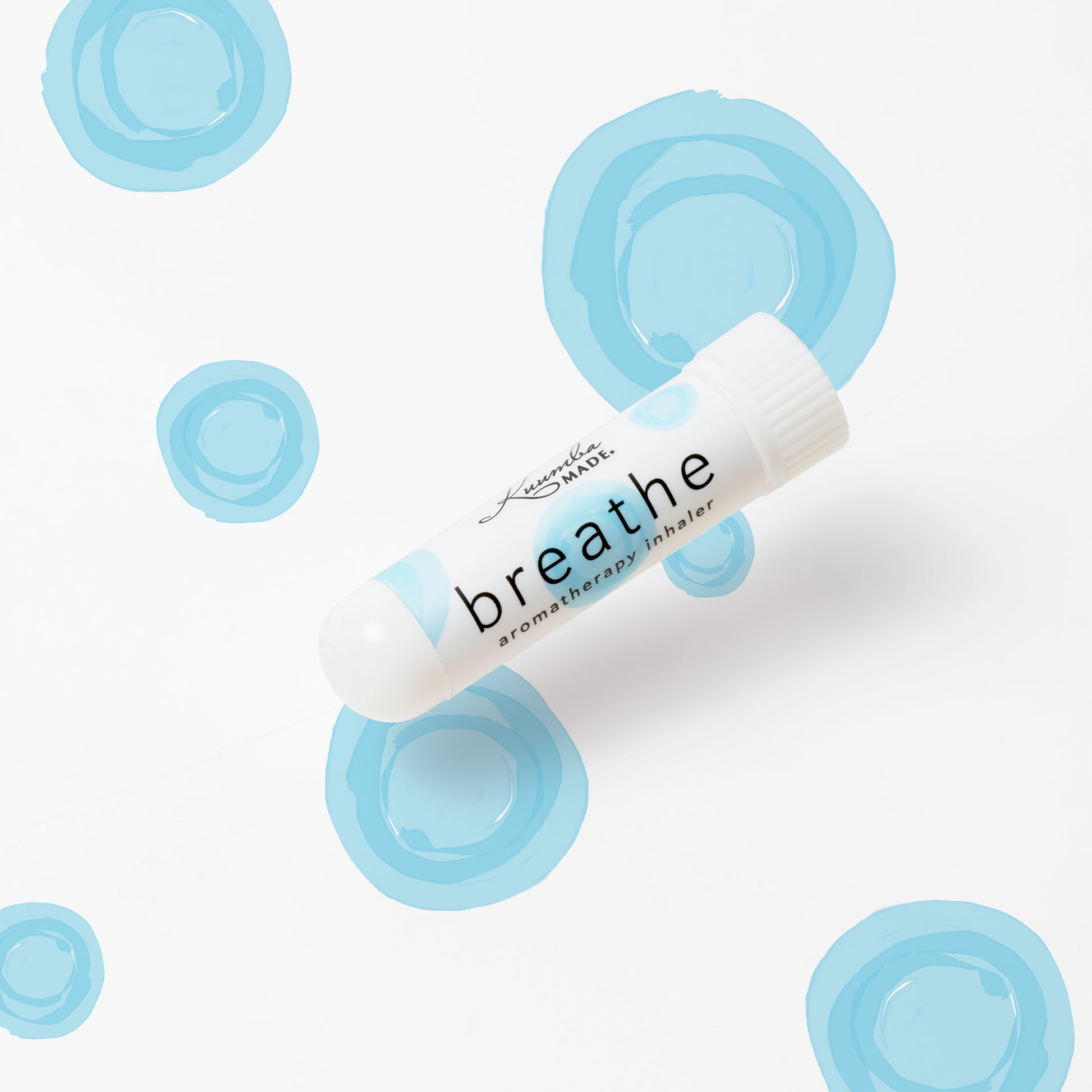 Breathe Personal Aromatherapy Inhaler from Kuumba Made with blue dots in the background